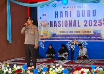 Kapolsek Pangkalan Kerinci Hadiri Peringatan Hari Guru Nasional di SD IT Assalikin