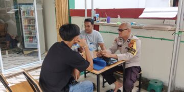 Bhabinkamtibmas Pangkalan Lesung Sambangi Warga, Ingatkan Jangan Buka Lahan Pakai Api