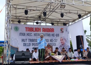 Kapolsek Kerumutan Dampingi Tabligh Akbar dan Pastikan Keamanan HUT Transmigrasi Desa Pematang Tinggi