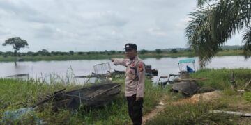 Polsek Pangkalan Kuras Pantau Sungai Kampar, Warga Diminta Waspada Potensi Banjir
