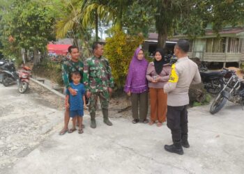 Polsek Langgam Perkuat Sinergi dengan TNI Koramil 09