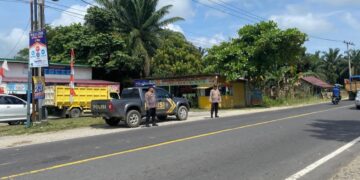 Polsek Pangkalan Lesung Gelar Patroli Rutin dan Pengaturan Lalu Lintas di Jalan Lintas Timur