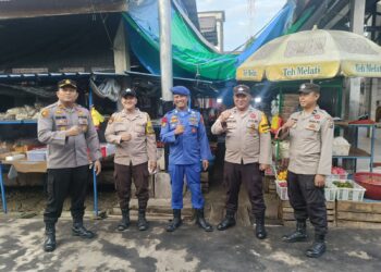 Kapolsek Kuala Kampar Sambangi Tempat Wisata dan Pasar Jelang Libur Natal dan Tahun Baru