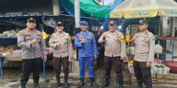 Kapolsek Kuala Kampar Sambangi Tempat Wisata dan Pasar Jelang Libur Natal dan Tahun Baru