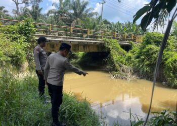 Polsek Pangkalan Kuras Patroli Bantaran Sungai Antisipasi Banjir