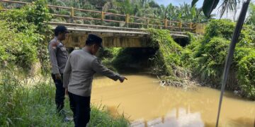 Polsek Pangkalan Kuras Patroli Bantaran Sungai Antisipasi Banjir