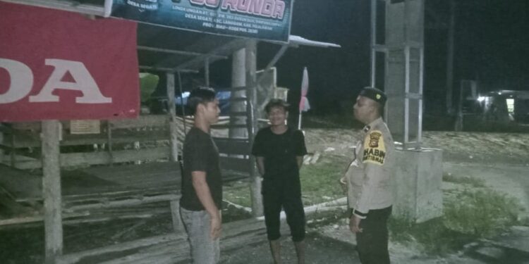 Polsek Langgam Cek Pos Kamling di Desa Segati untuk Jaga Keamanan