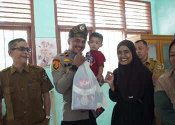 Kapolsek Kerumutan Hadiri Sunat Massal dan Pemberian Gizi Tambahan Anak