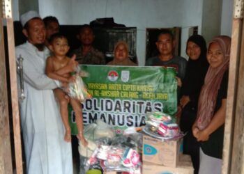 Hujan Deras, Relawan Arita Cipta Karya Bersama Tim Al Anshar Calang Tetap Semangat Salurkan Bantuan Di Aceh Tamiang