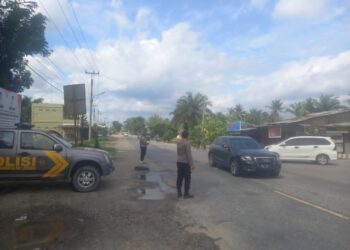 Polsek Pangkalan Lesung Atur Lalu Lintas Pasca Operasi Lilin, Arus Lalin Lancar