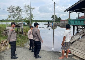 Antisipasi Banjir, Polsek Pangkalan Kuras Patroli Bantaran Sungai Kampar