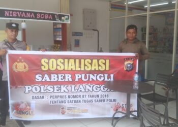 Polsek Langgam Sosialisasikan Saber Pungli di Pasar Segati