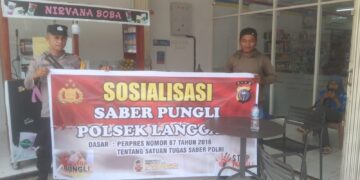 Polsek Langgam Sosialisasikan Saber Pungli di Pasar Segati