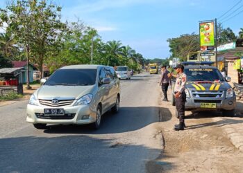 Patroli Rutin Polsek Pangkalan Lesung Tingkatkan Keamanan Lalu Lintas di Pelalawan