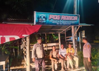 Cek Pos Kamling, Polsek Langgam Intensifkan Harkamtibmas di Desa Segati
