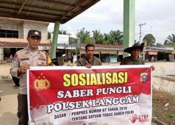 Polsek Langgam Sosialisasikan Saber Pungli untuk Masyarakat dan Petugas Pelayanan