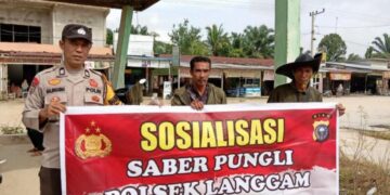 Polsek Langgam Sosialisasikan Saber Pungli untuk Masyarakat dan Petugas Pelayanan