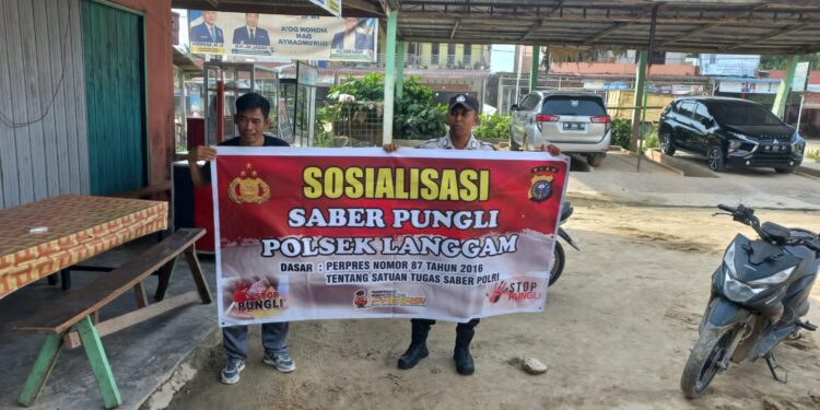 Polsek Langgam Sosialisasikan Saber Pungli ke Masyarakat dan Petugas Pelayanan