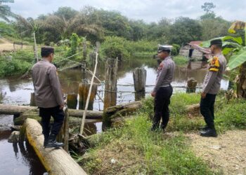 Antisipasi Banjir, Polsek Pangkalan Kuras Laksanakan Patroli Bantaran Sungai Napu