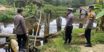Antisipasi Banjir, Polsek Pangkalan Kuras Laksanakan Patroli Bantaran Sungai Napu