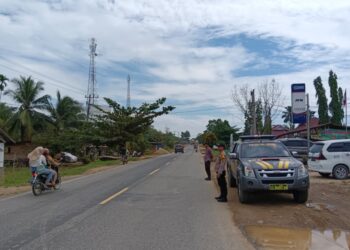 Polsek Pangkalan Lesung Laksanakan Pengaturan Lalu Lintas, Cegah Laka dan Pelanggaran