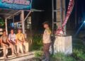 Polsek Langgam Cek Pos Kamling di Desa Segati, Warga Diajak Aktif Jaga Keamanan