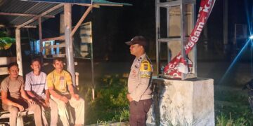 Polsek Langgam Cek Pos Kamling di Desa Segati, Warga Diajak Aktif Jaga Keamanan