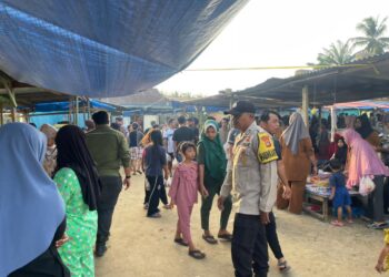 Polsek Kerumutan Amankan Pasar Ramadhan, Pastikan Lalu Lintas Lancar