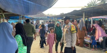 Polsek Kerumutan Amankan Pasar Ramadhan, Pastikan Lalu Lintas Lancar