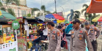 Polisi Amankan Pasar Ramadhan di Sorek Pelalawan, Pastikan Lalin Lancar dan Aman