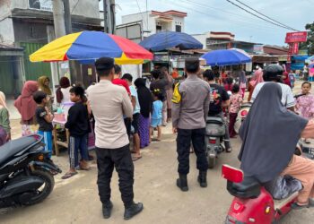 Polsek Langgam Amankan Pasar Tumpah Selama Ramadan 1447 H, Cegah Kejahatan dan Gangguan Kamtibmas