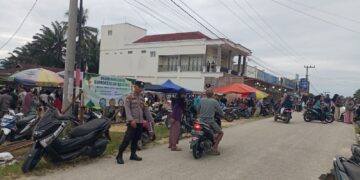 Polsek Kerumutan Amankan Pasar Ramadhan, Lalu Lintas Tetap Lancar