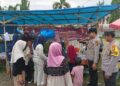 Tingkatkan Rasa Aman Warga, Polsek Bunut Amankan Pasar Tumpah Ramadhan