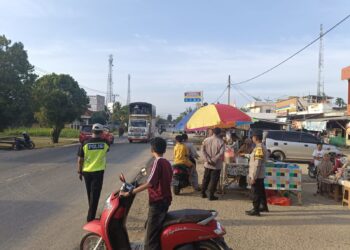 Polsek Pangkalan Lesung Amankan Pasar Ramadhan, Cegah Laka Lantas dan Gangguan Kamtibmas