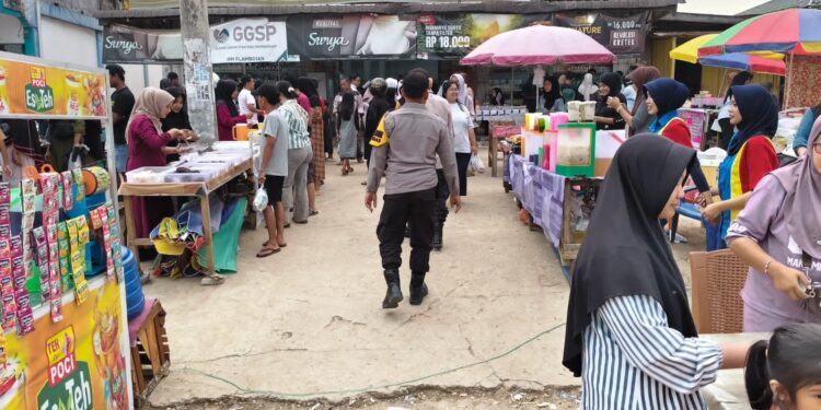 Selama Ramadhan, Polsek Ukui Intensifkan Pengamanan Pasar Ramadhan di Sore Hari