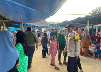 Polisi Patroli di Pasar Ramadhan Kerumutan, Cegah Kemacetan dan Berikan Rasa Aman