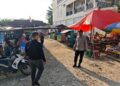 Polisi Kerumutan Tertibkan Lalu Lintas di Pasar Ramadhan Desa Bukit Lembah Subur