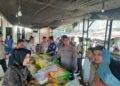 Operasi Pasar Murah Polres Pelalawan, Ribuan Warga Pangkalan Kerinci Antusias Belanja Bahan Pangan