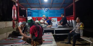 Polsek Kerumutan Cek Pos Kamling, Tingkatkan Harkamtibmas di Desa Beringin Makmur
