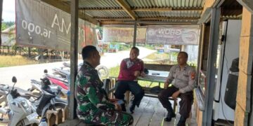 Polsek Langgam Perkuat Sinergi dengan TNI, Jaga Kamtibmas Tetap Kondusif