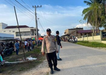 Polsek Kerumutan Gelar Tertib Ramadhan dan Pengaturan Lalu Lintas di Pasar Desa Bukit Lembah Subur