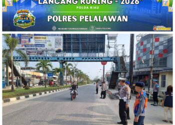 Polisi Atur Lalu Lintas di Jalan Lintas Timur Pangkalan Kerinci