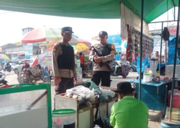 Polsek Ukui Gencarkan Patroli Pasar Tradisional, Wujudkan Rasa Aman Pedagang dan Pembeli