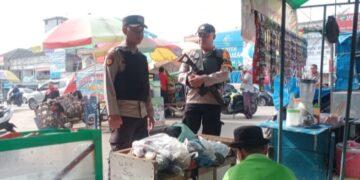Polsek Ukui Gencarkan Patroli Pasar Tradisional, Wujudkan Rasa Aman Pedagang dan Pembeli