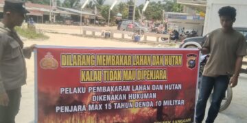 Polsek Langgam Sosialisasikan Larangan Membakar Hutan dan Lahan di Desa Segati