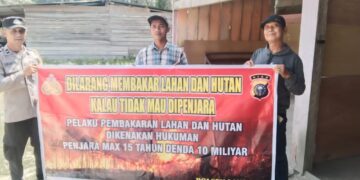 Polsek Langgam Sosialisasikan Larangan Membakar Hutan dan Lahan di Desa Segati