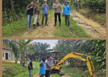 Bhabinkamtibmas Desa Angkasa Tinjau Pembersihan Parit Bantuan PT Serikat Putra di Pelalawan