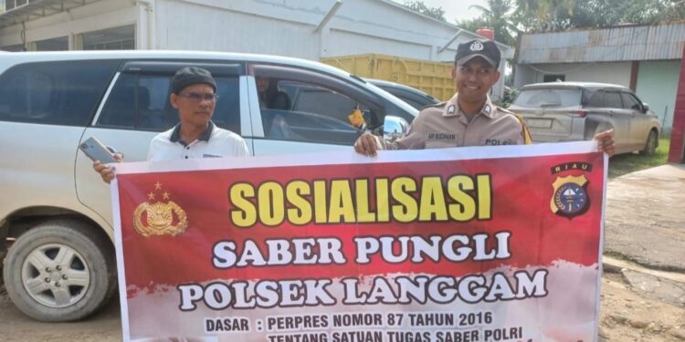 Polsek Langgam Sosialisasikan Saber Pungli, Warga Diminta Tolak Praktik Pungutan Liar