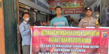 Polsek Langgam Sosialisasikan Larangan Karhutla kepada Warga Desa Segati