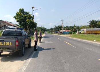 Polsek Pangkalan Lesung Gelar Patroli Rutin di Jalur Lintas Timur, Antisipasi Laka dan C3